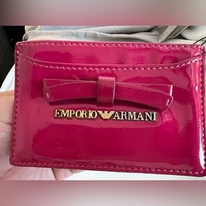 Emporio Armani card holder. Magenta color